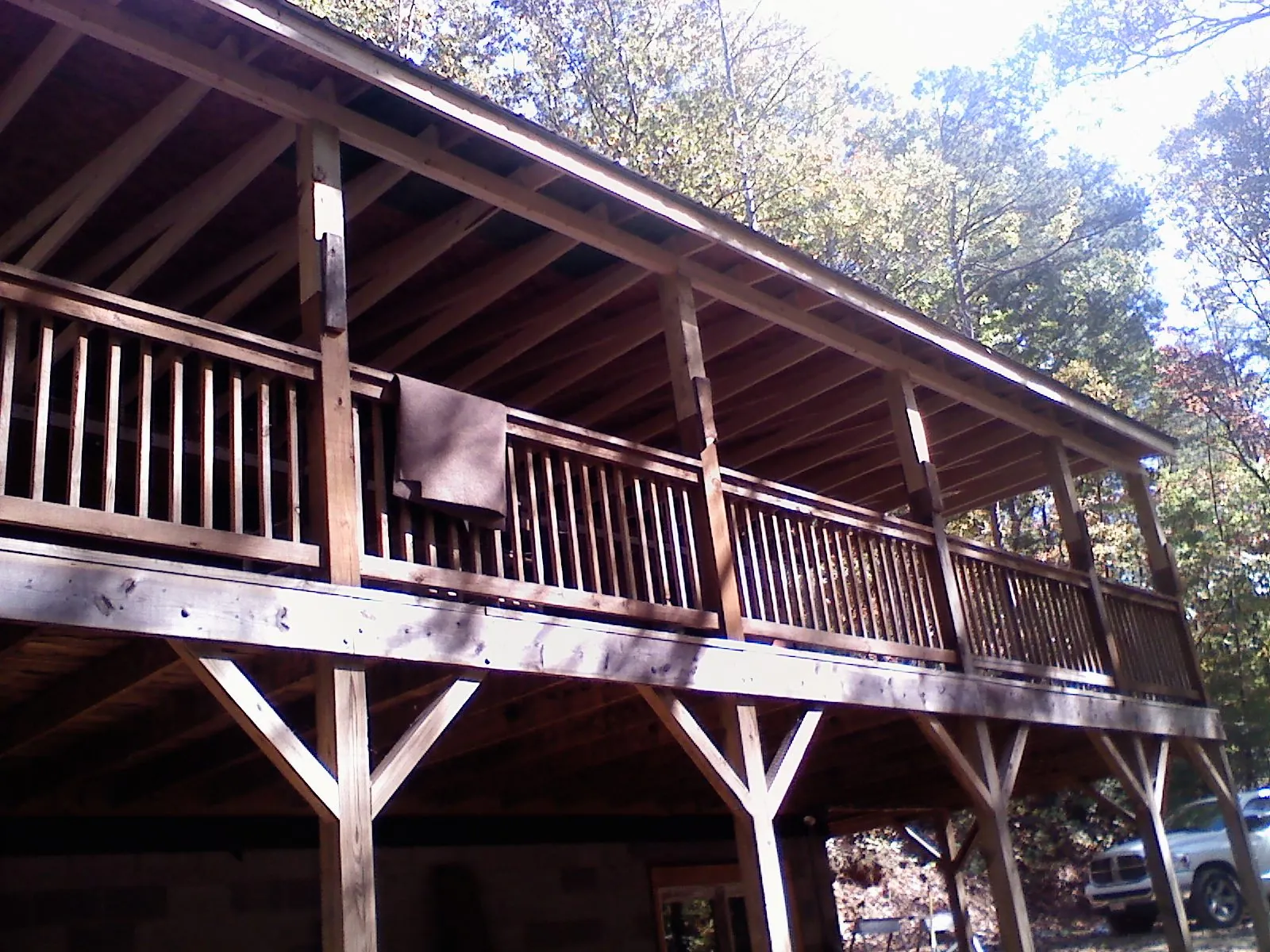 Timber framing under a new elevated porch and deck — Roof Leak Repair in Kingston Mines by Roofing Brothers